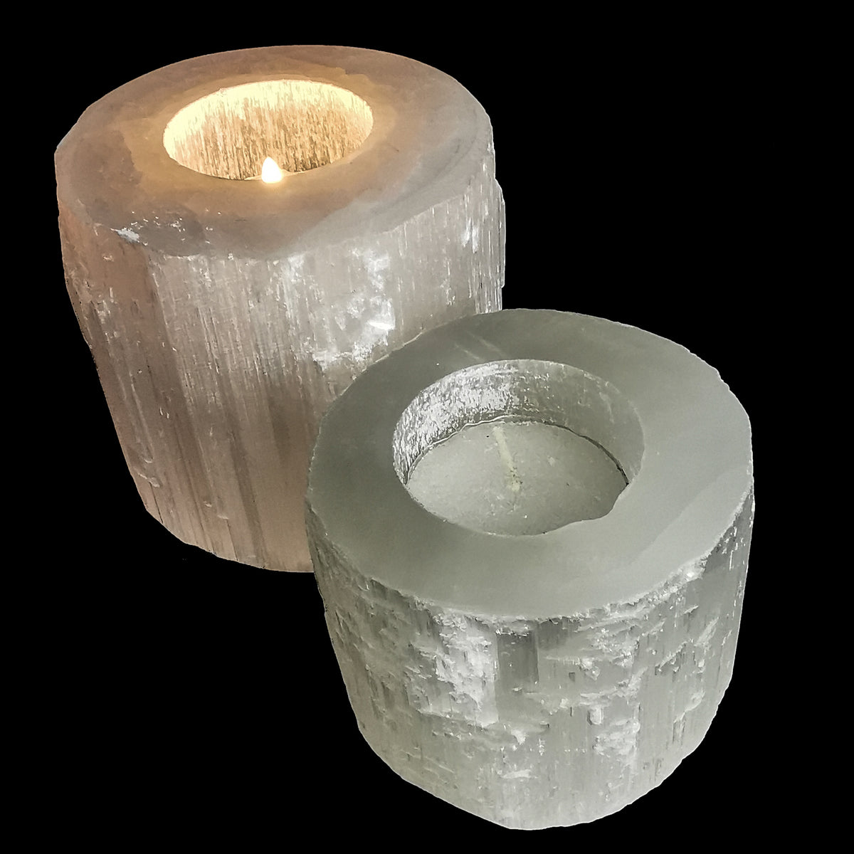 Selenite raw edge candle holder, a variety of gypsum, from Morocco.