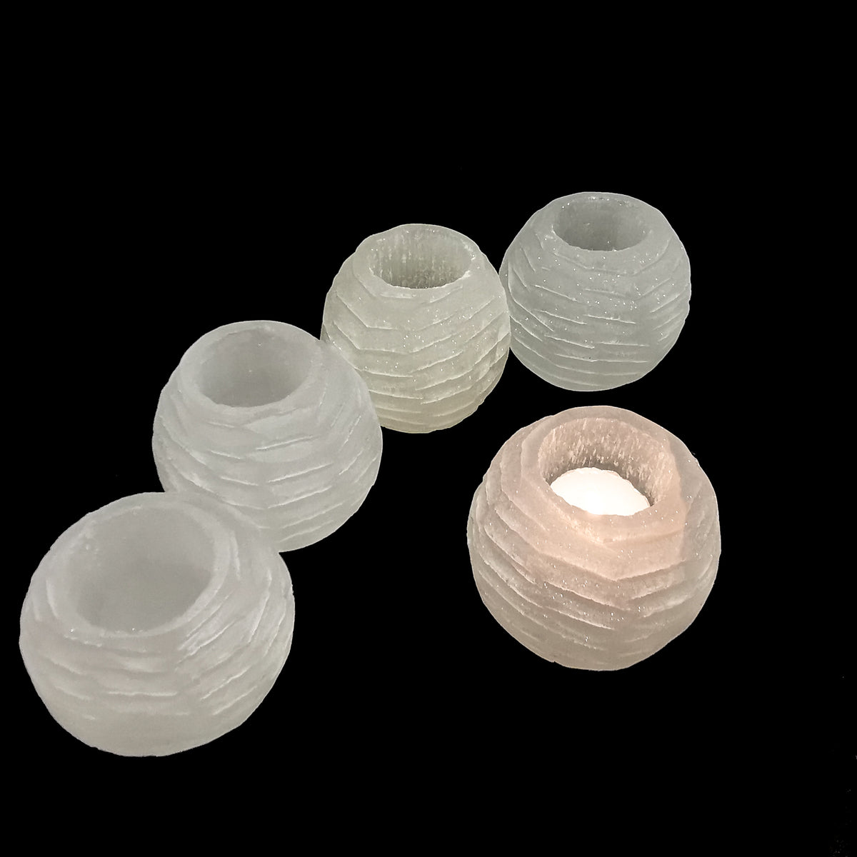 Selenite ridged circle candle holder, a variety of gypsum, from Morocco.