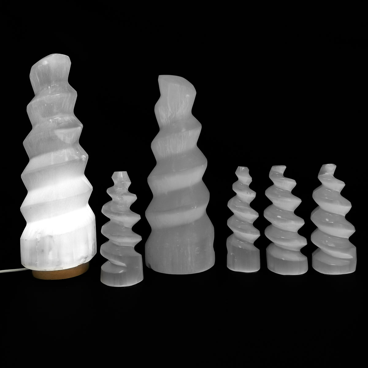 Selenite spiral tower from Morocco – lit tower with smaller towers