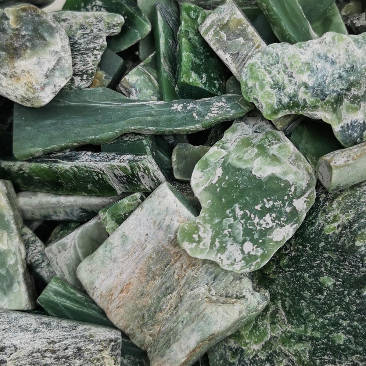 Siberian Nephrite Jade light green rough from Siberia, Russia.