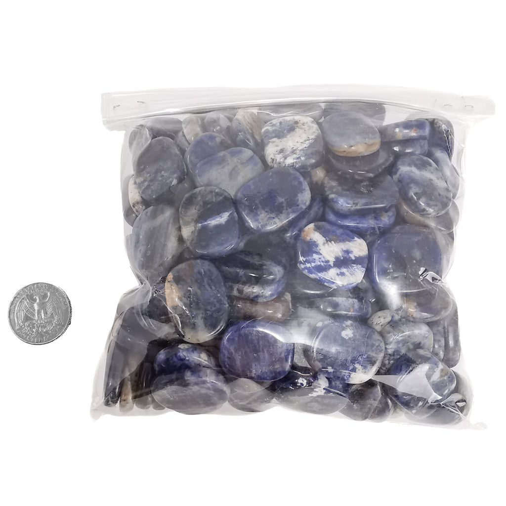 Sodalite mini palm stone flat tumble – bag beside a coin for scale