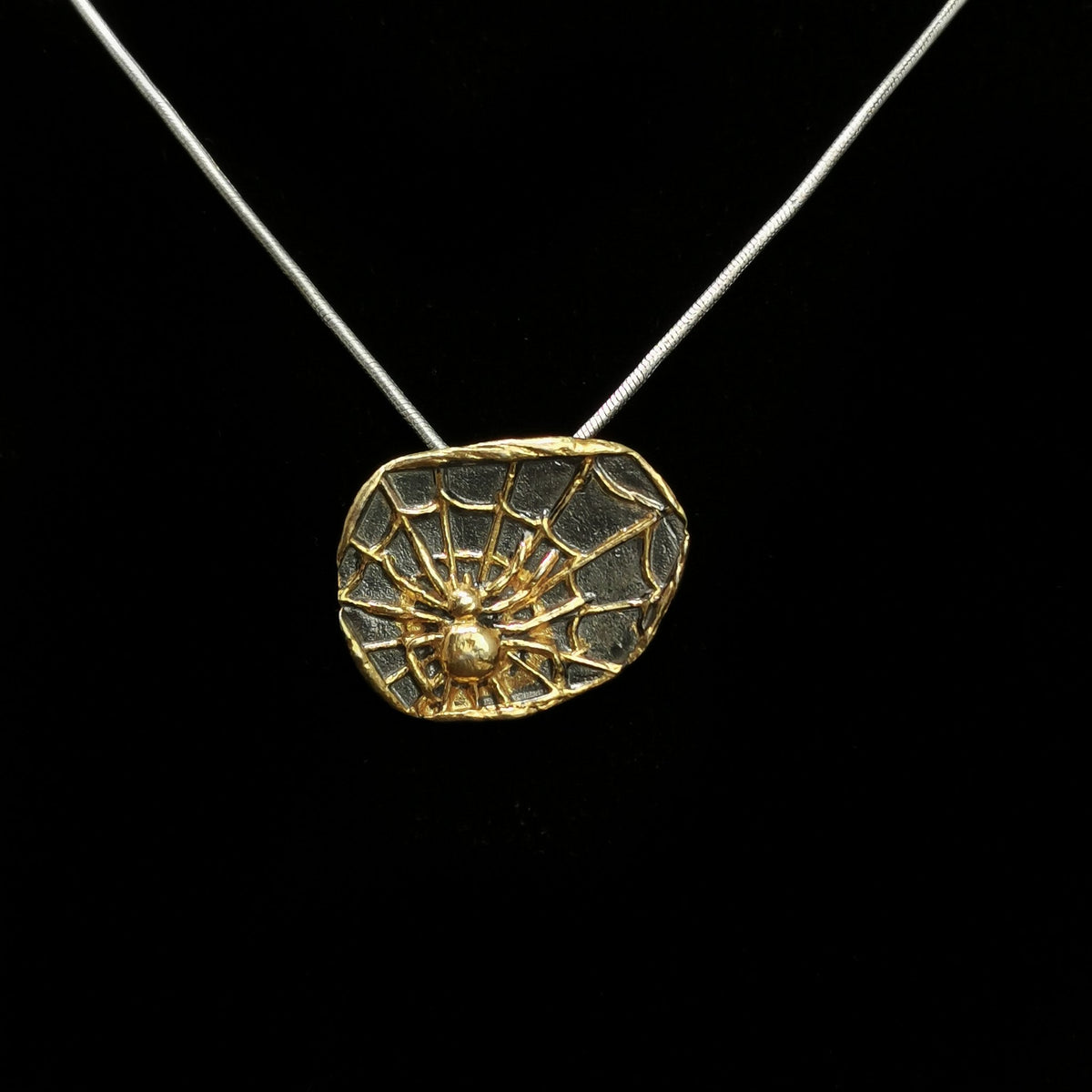 Spider On Web pendant.