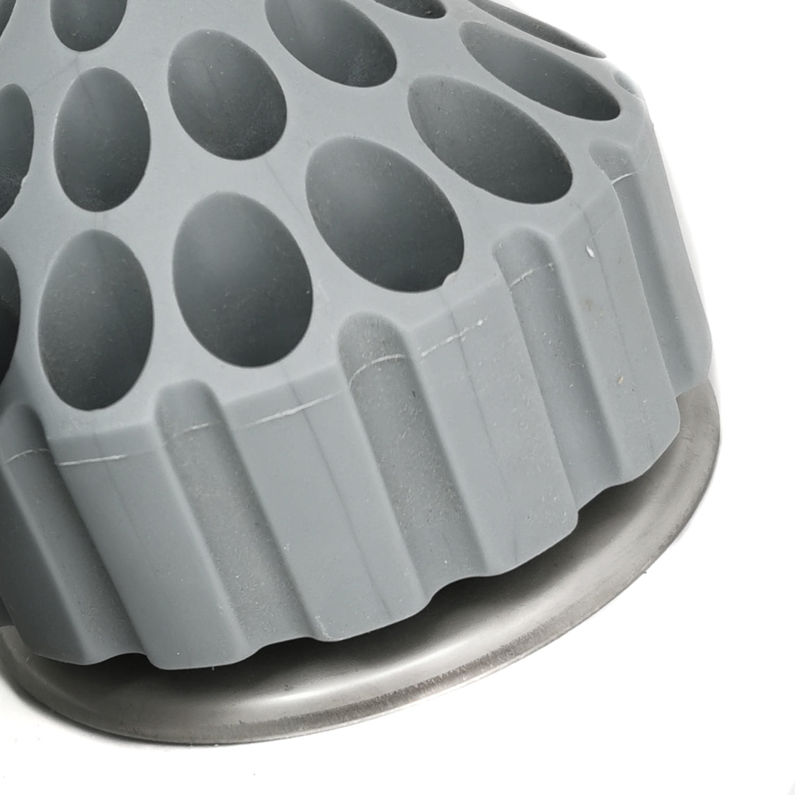 Spinning burr holder, made of plastic and metal.