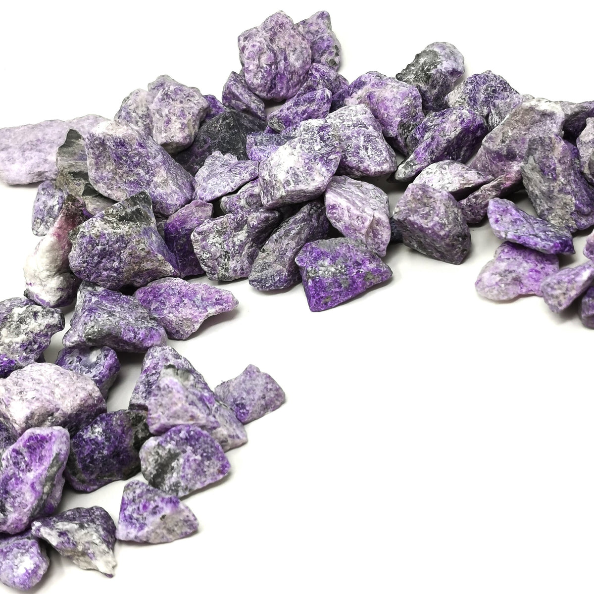 Sugilite rough from Wessels Mine, Northern Cape Province, South Africa.