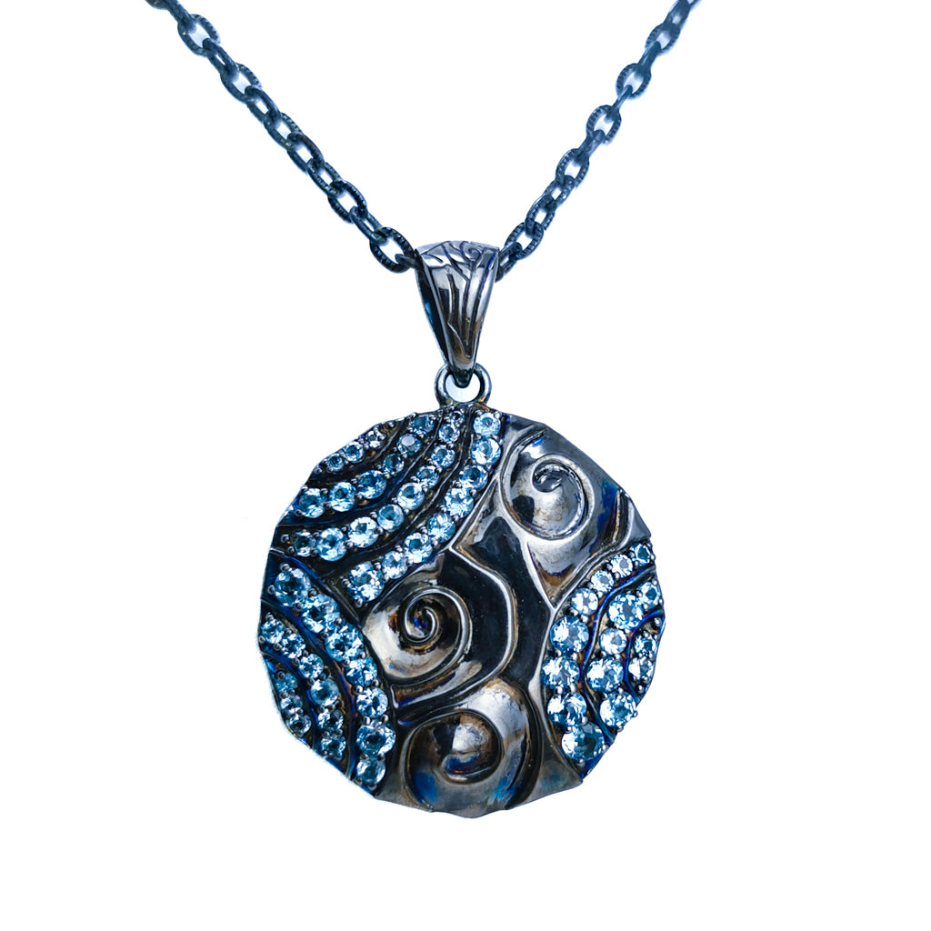 Black Ice swirl medallion pendant in black rhodium-plated sterling silver with London Blue Topaz.