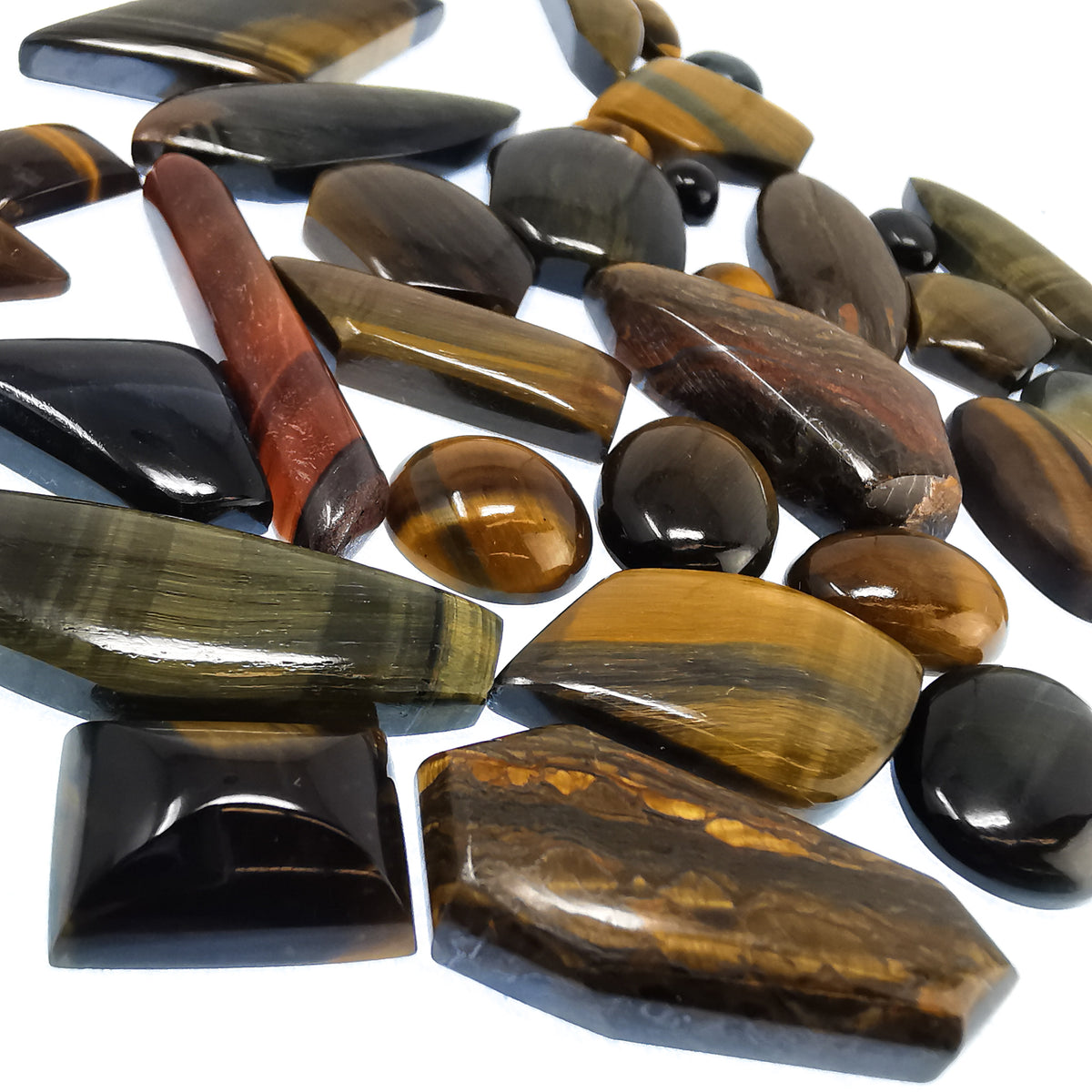 Tigers Eye cabochon, a variety of quartz, from Northern Cape, South Africa.