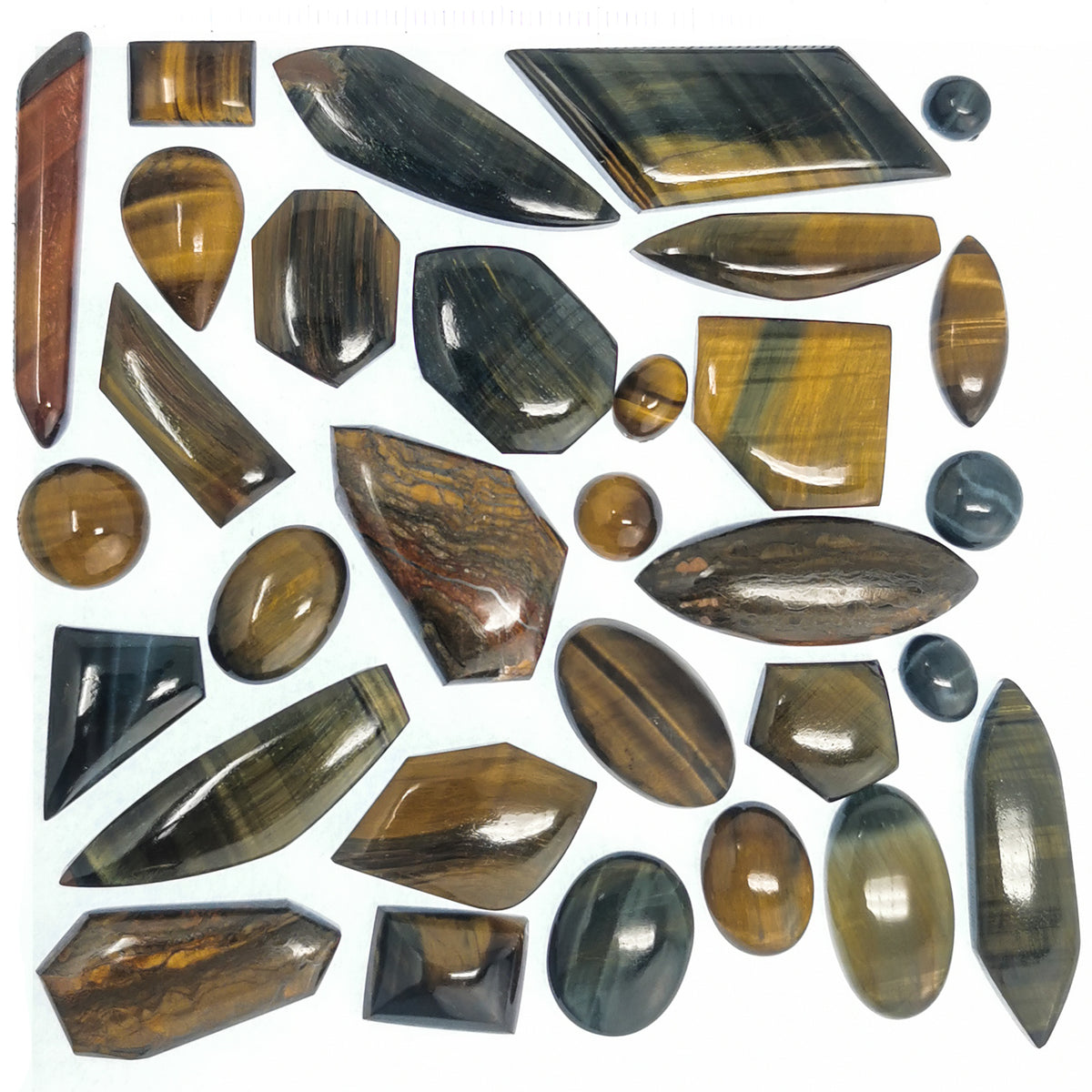 Tigers Eye cabochon, a variety of quartz, from Northern Cape, South Africa.