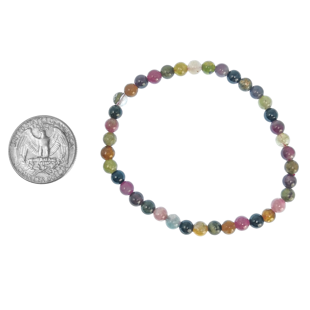 Tourmaline round bead bracelet – bracelet beside a coin for scale