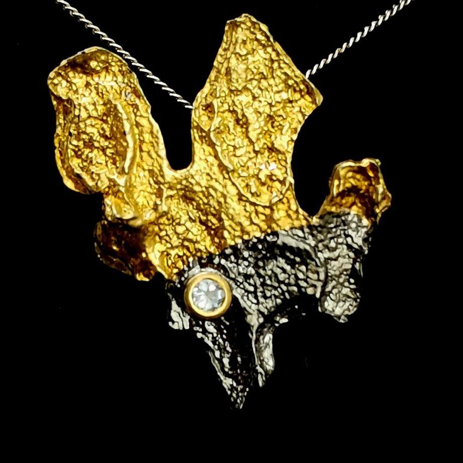 Tree Bark pendant with Sky Blue Topaz.