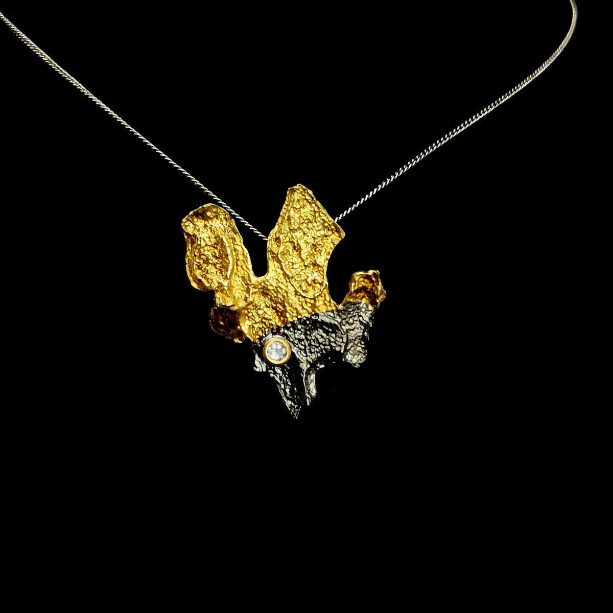 Tree Bark pendant with Sky Blue Topaz.