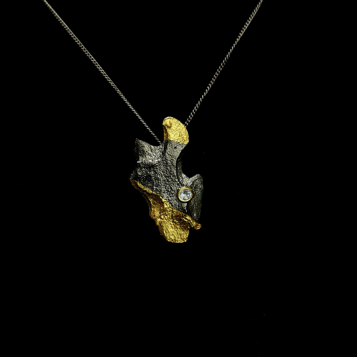 Tree Bark pendant with Chrome Diopside and Sky Blue Topaz.