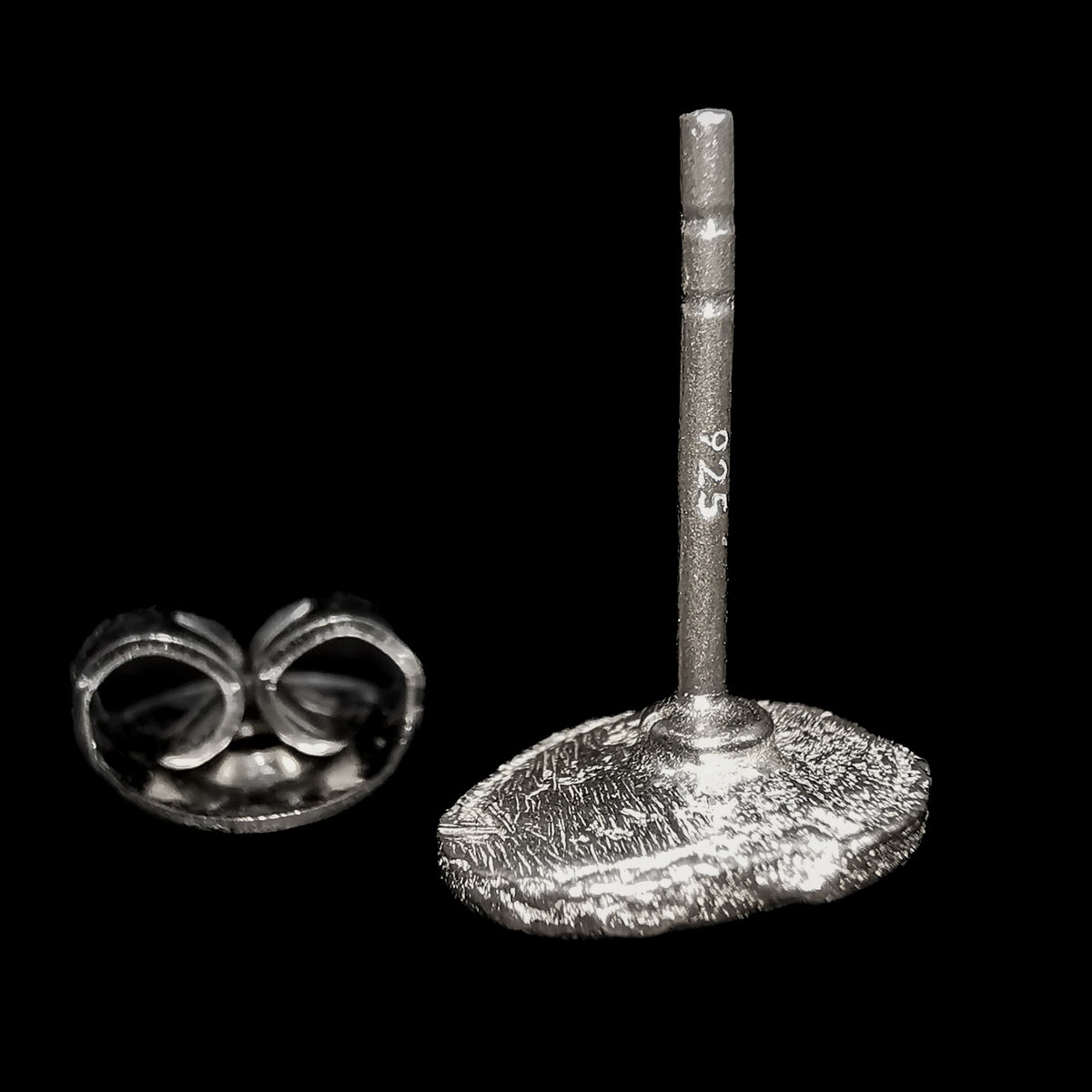 Trilobite stud earrings: side view of stud post